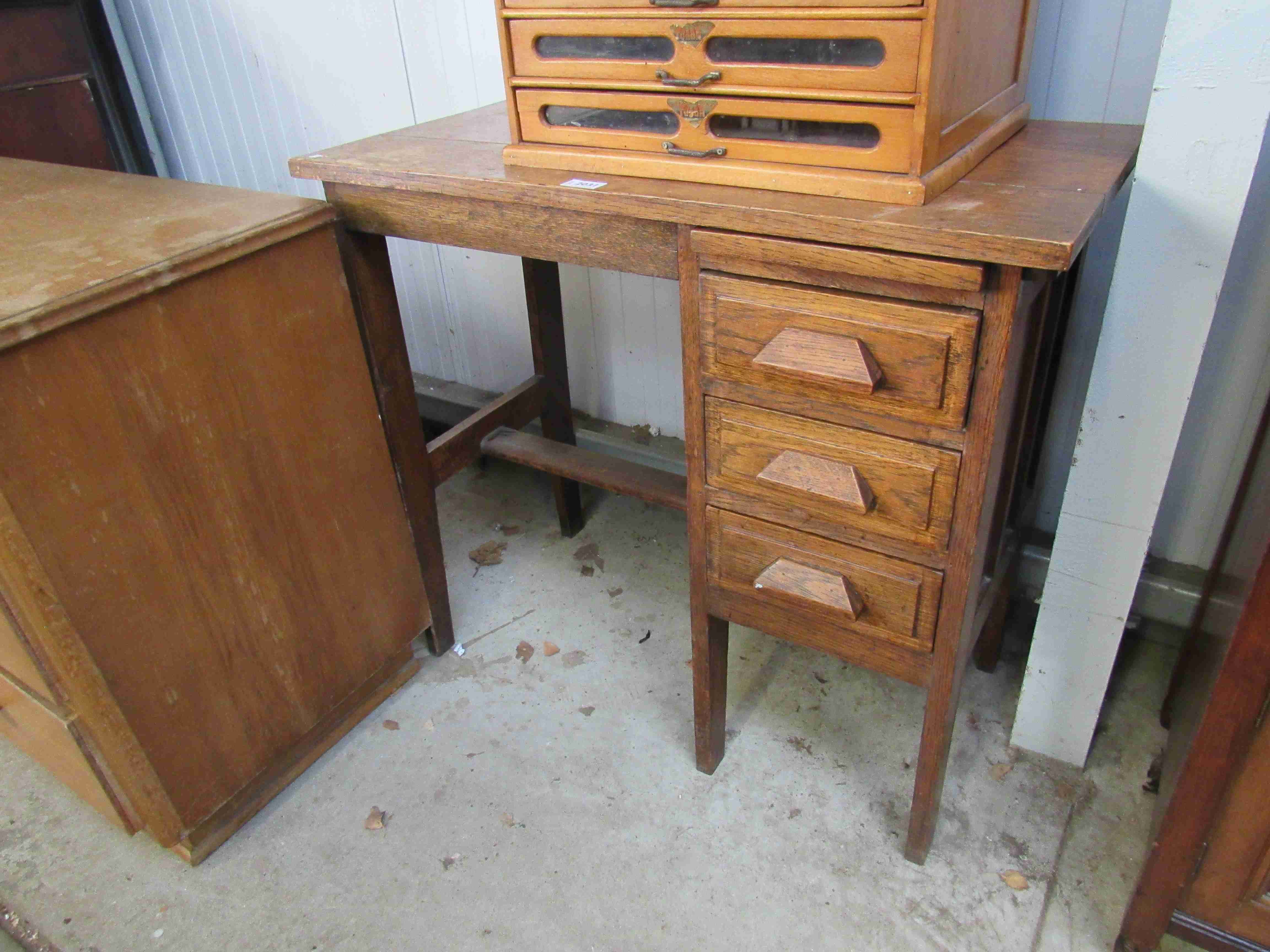 A 1930's oak ladies office desk