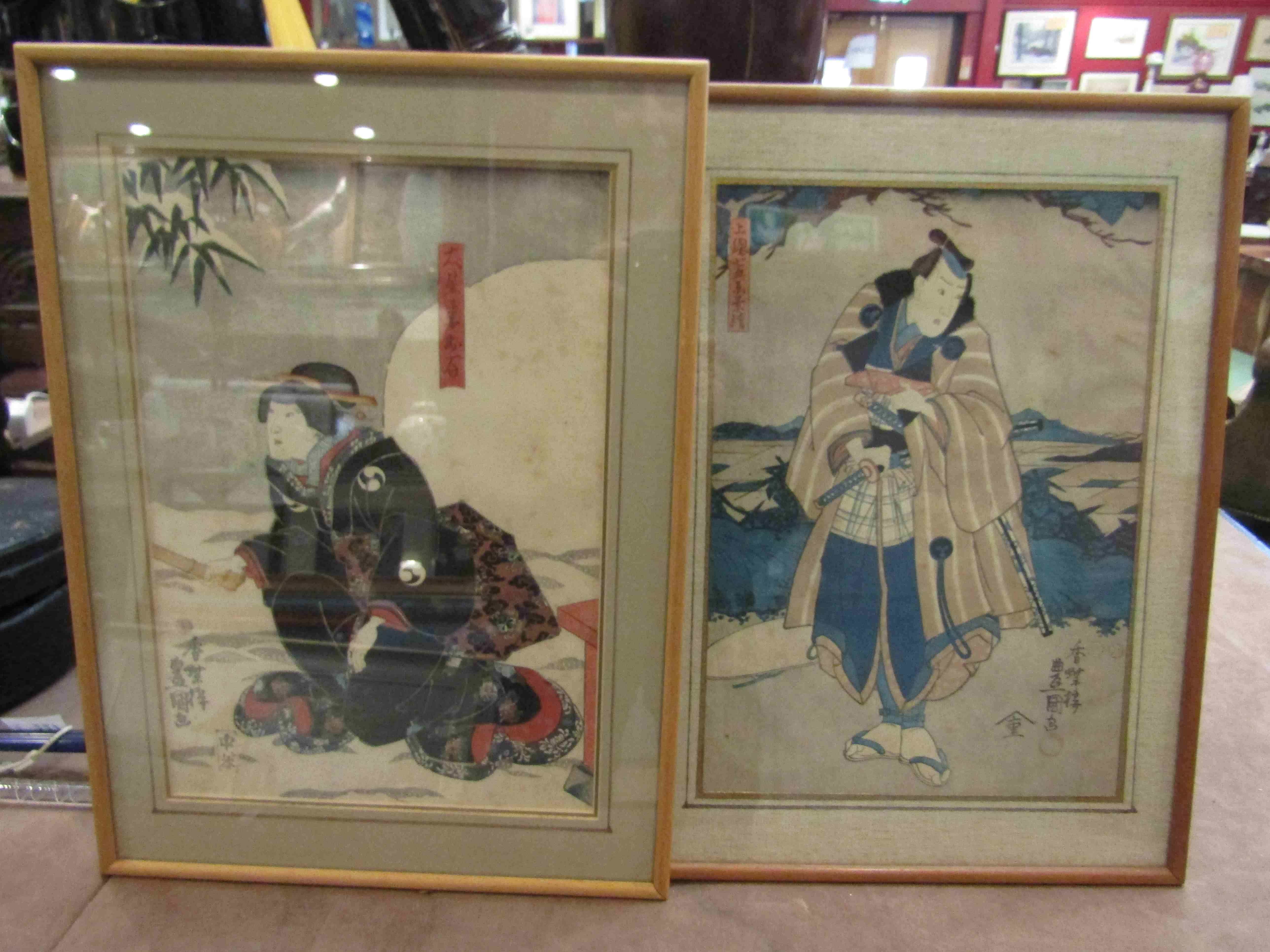 A matched pair of 19th Century Japanese woodblock prints including Samurai Warrior,