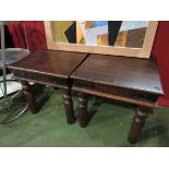 A pair of square hardwood occasional tables with metal stud embellishments,