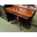 A Victorian flame mahogany tea table converted into a side table,