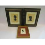 Three 19th Century portrait silhouettes on card, a lady with a ruffle collar 14cm x 9cm.