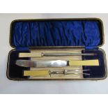 A Taylor carving set in case