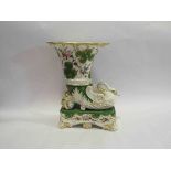 A Victorian porcelain trumpet vase with swan form relief, scrolled supports,