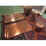 Assorted copper wares including two trays, lidded jug,