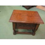 An oak Jacobean style box stool