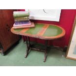 A mahogany occasional table with green leather inserts