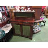 A circa 1800 mahogany chiffonier the three quarter pierced brass gallery and raised shelf on reeded