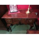 A Georgian oak lowboy with crossbanded fitted drawers on pad feet,