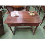 A 17th Century oak single drawer side table,