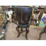 WITHDRAWN - A 19th Century lignum vitae apothecary mortar on associated four legged stand,