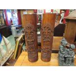 A pair of carved bamboo containers with figural and boating scenes