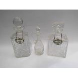 Two heavy glass decanters with ceramic spirit labels and another (3)