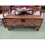 A six plank elm coffer with carved front panel, dated 1722, candle box to interior,