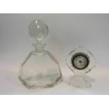 A faceted glass oversized scent bottles and timepiece