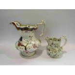 A floral patterned jug and another