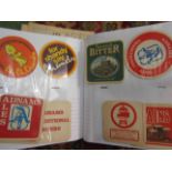 An album of vintage beer mats