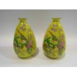 A pair of Shelley yellow ground vases with floral and bird decoration, 14.