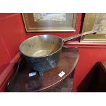 A 19th Century bronze pan on footed base,