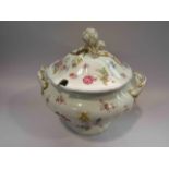 An early to mid 20th Century ceramic twin handled soup tureen with hand painted floral sprays