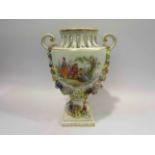 A Meissen style urn with floral swag decoration, restored,