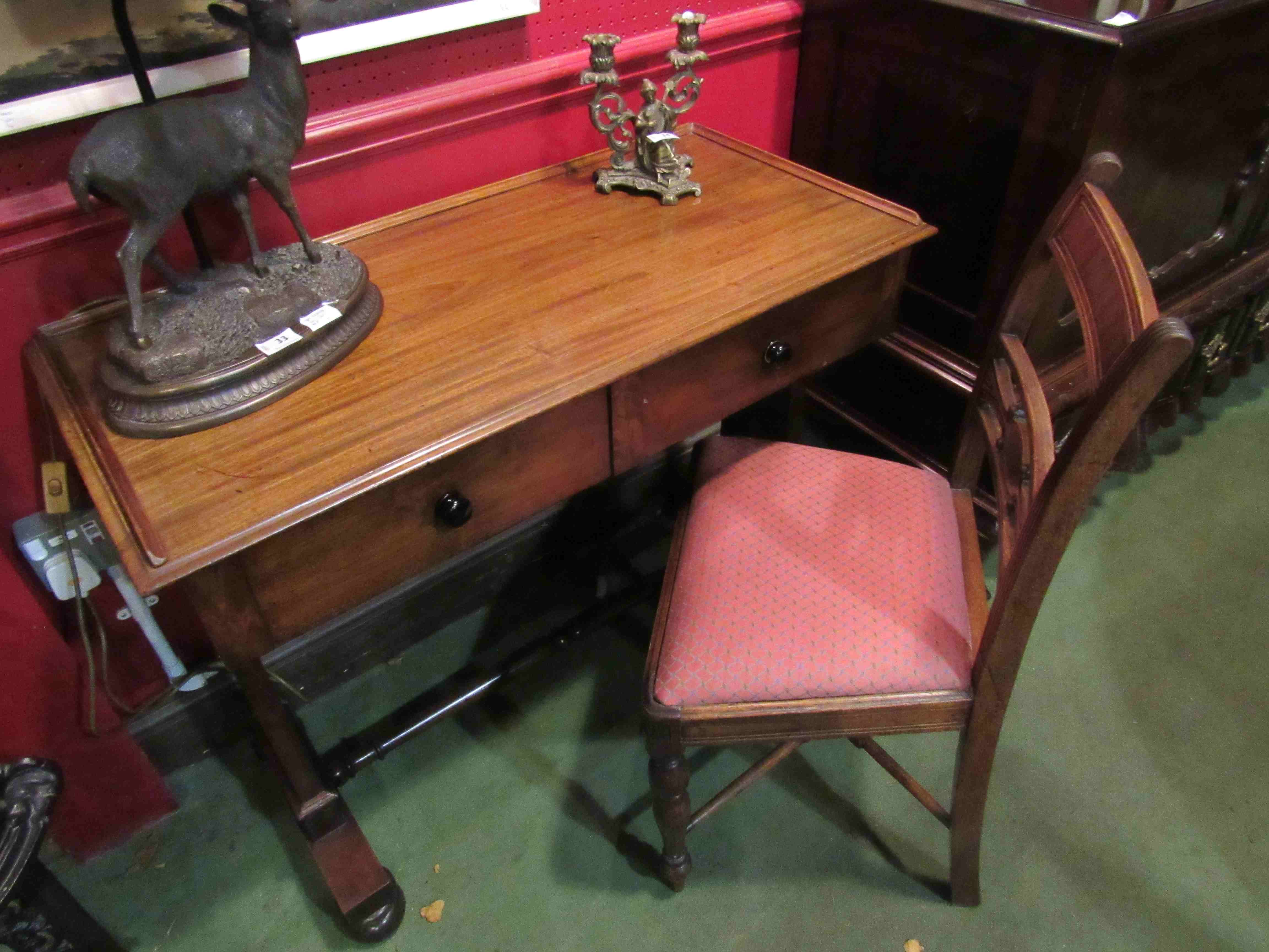 A Victorian two drawer lady's desk and a chair (2)