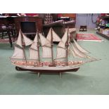 A scratch built model of a boat on stand, 54cm tall,