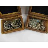 Two carved wooden trinket boxes with bijouterie contents including Sterling and 925 brooches,