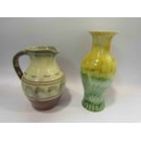 A Wattisfield cream and brown glazed jug and a yellow and green glazed vase