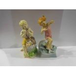 Two Royal Worcester figures "June " model No 3-455 boy with dog,
