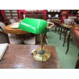 A green glass bankers lamp,