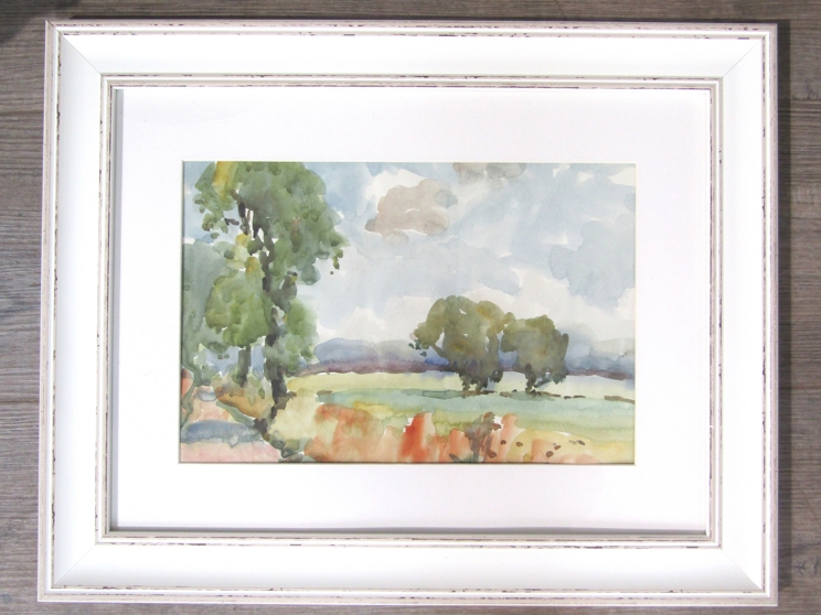 An unsigned watercolour of rural landscape, framed and glazed,