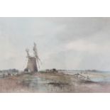 ARTHUR EDWARD DAVIES (1893-1988): A framed and glazed watercolour, "Reedham Mill & Marshes", signed.