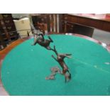 A medium pair of limited edition solid bronze boxing hares, boxed with certificate 121/250,