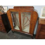 An early 20th Century walnut Deco display cabinet,