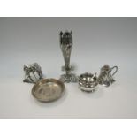 A silver salt, Eastern plated elephant and shaker with foliage design,