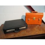 A leather attache case and satchel