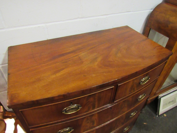 A circa 1840 flame mahogany bow front chest of two short over three drawers, - Image 2 of 2