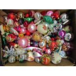 A box containing decorative Christmas baubles some vintage