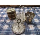 A basket containing sherry glasses and plated ware,