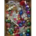 A box containing decorative Christmas baubles some vintage