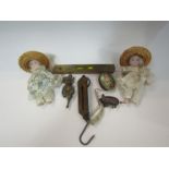 Two novelty tape measures, spirit level, pocket balance scale and imp door knocker etc.