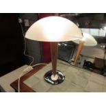 A modern Swedish table lamp with beech and chrome effect base,