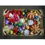 A box containing decorative Christmas baubles some vintage
