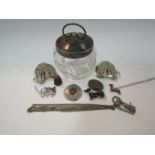 A glass preserve jar, watch chain, engraved locket,