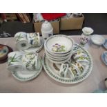 A collection of Portmeirion Botanic garden table wares including six bowls, six napkin rings,