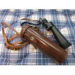 A Barr & Stroud 10x CF47A monocular with fitted brown leather case