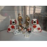 A pair of Oriental porcelain figures,
