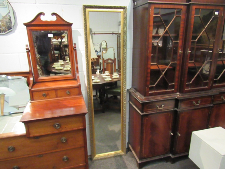 A rectangular gilt framed wall mirror,