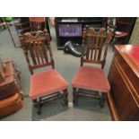 A set of Edwardian oak dining chairs with dusky pink upholstered seats (4+2),