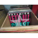 A box of assorted LP's including Pink Floyd, Simon and Garfunkel, Genesis,